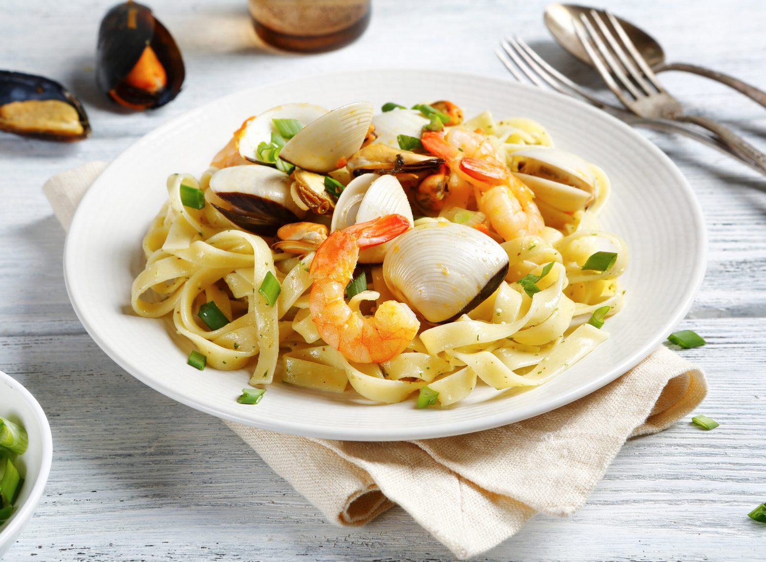 Spaghetti with seafood on a plate, food